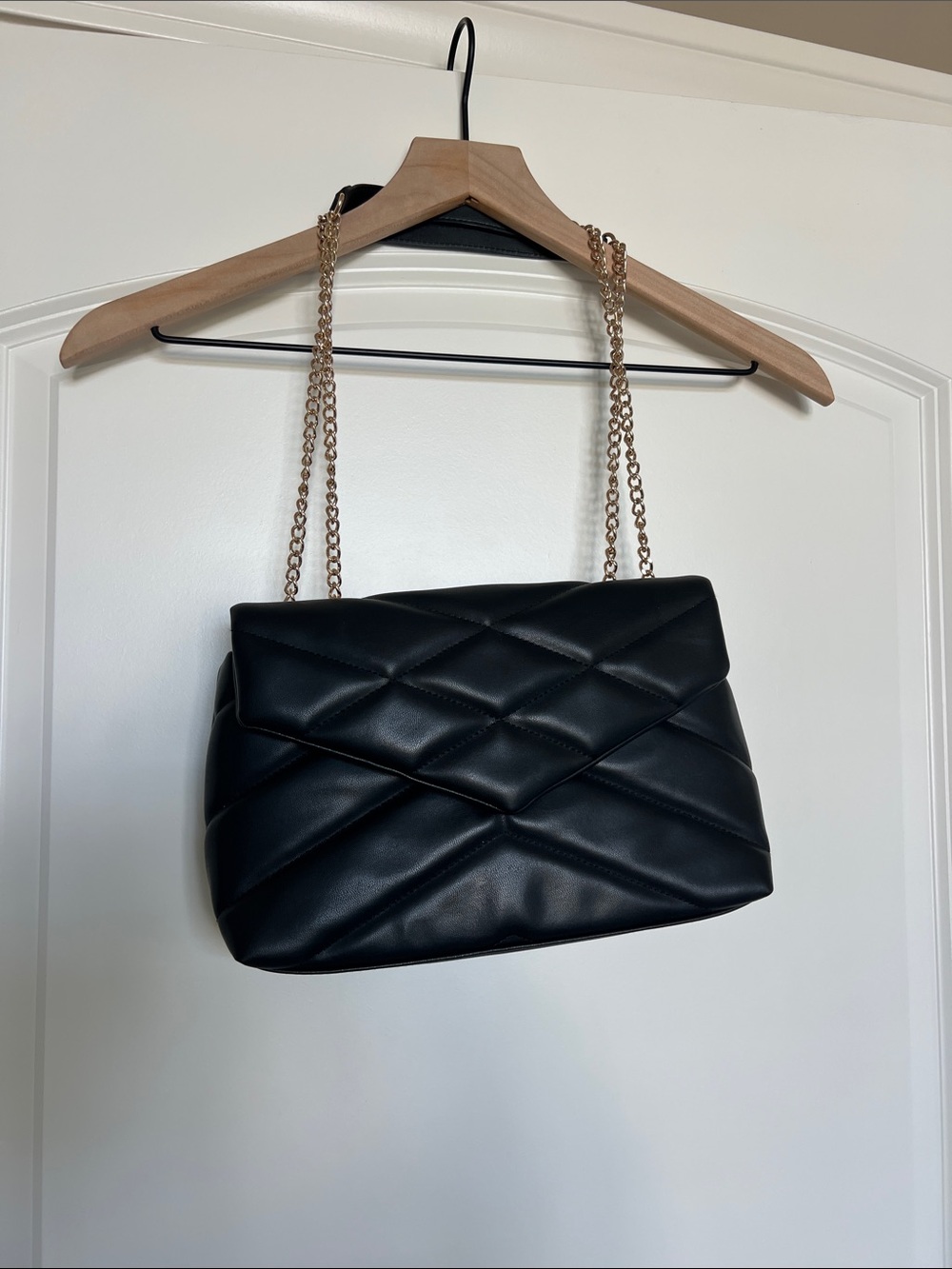 Black purse with adjustable strap